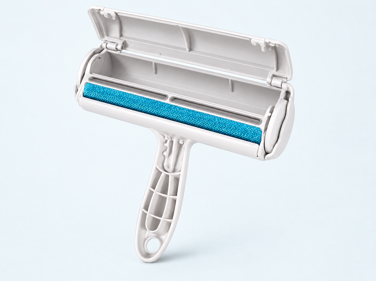 The roller with its lid open, showing the empty hair collection chamber